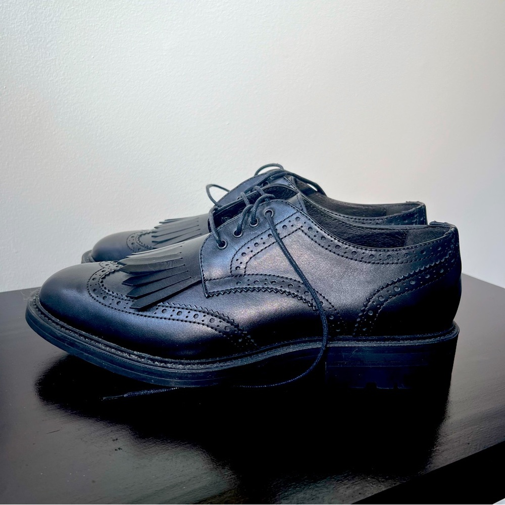Black leather lace up shoes. Unworn